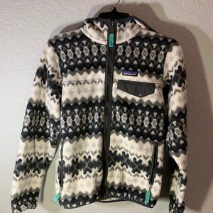 Patagonia brand grey and white jacket